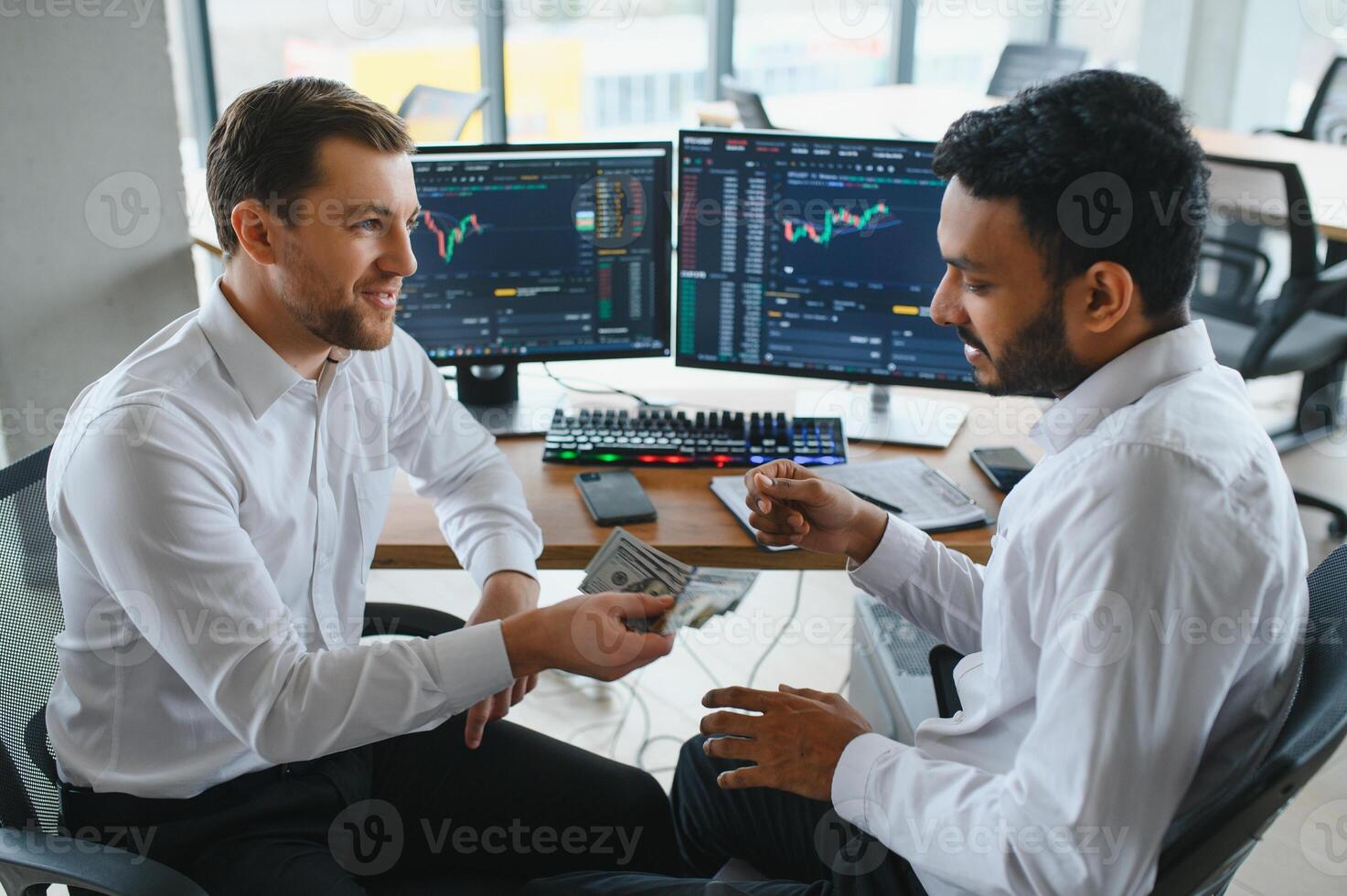 Two diverse crypto traders brokers stock exchange market investors discussing trading charts research reports growth using pc computer looking at screen analyzing invest strategy, financial risks. photo
