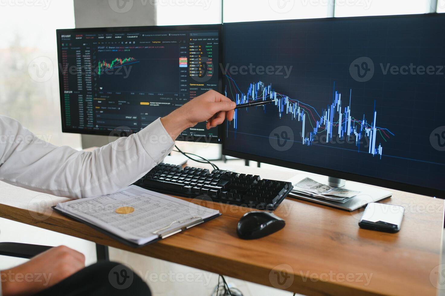 Businessman hand analysing financial stock market graph on board. Trading data index investment growth chart. Cryptocurrency and Forex Concept. photo