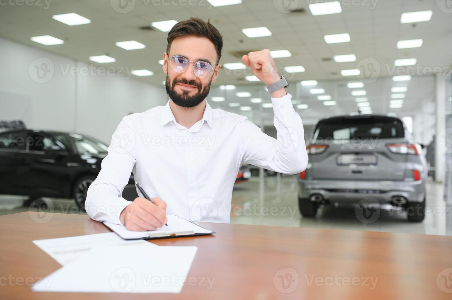 I have a new car. client signing car lease form. photo