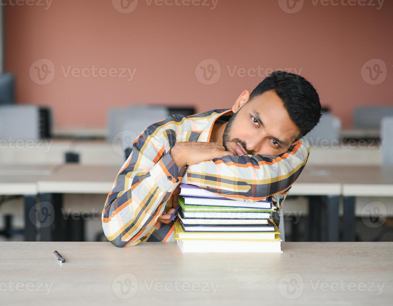 indian student with books at university photo