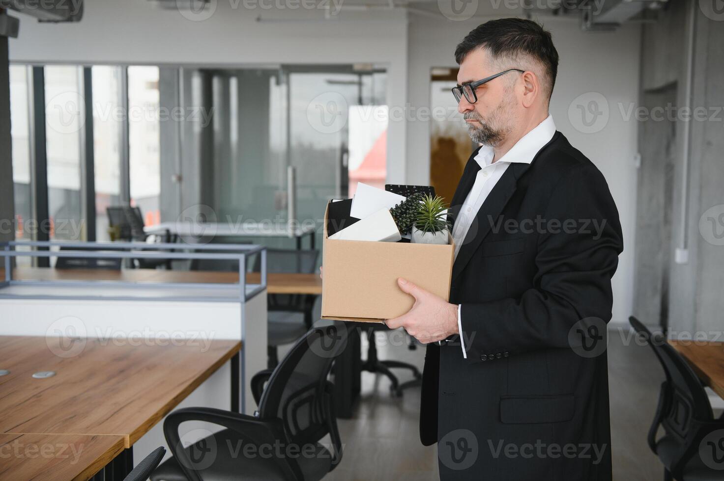 Old businessman employee in relocation concept photo