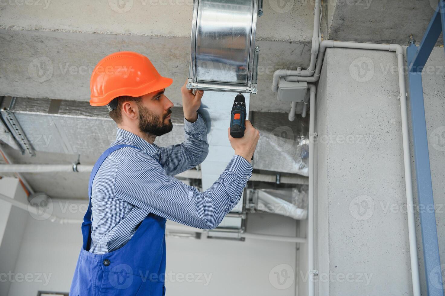 ventilation system installation and repair service. hvac technician at work. banner copy space. photo