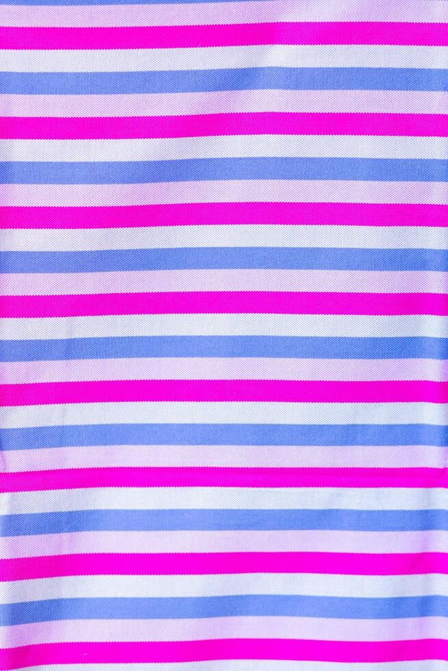 Thai silk with beautiful patterns and a high price because silk is added using ancient methods to produce fibers and weaving with ancient weaving machines resulting in beautiful patterned silk. photo