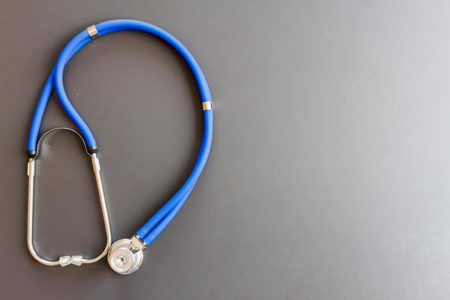 image blur doctor's stethoscope is prepared when it comes to emergencies, when there is an accident patient or the patient is unconscious because the stethoscope is used to listen to the heartbeat. photo