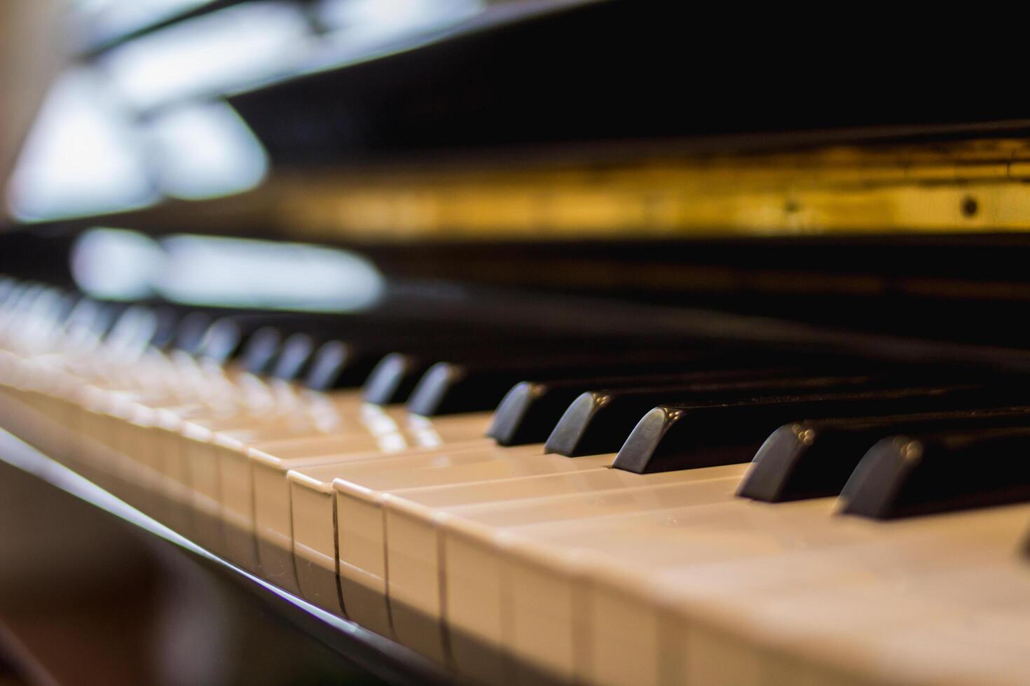 Beautiful piano background are set by the window in the morning waiting for the pianist to come to practice in the morning to reduce the mistake of having to perform the piano performance at a concert photo