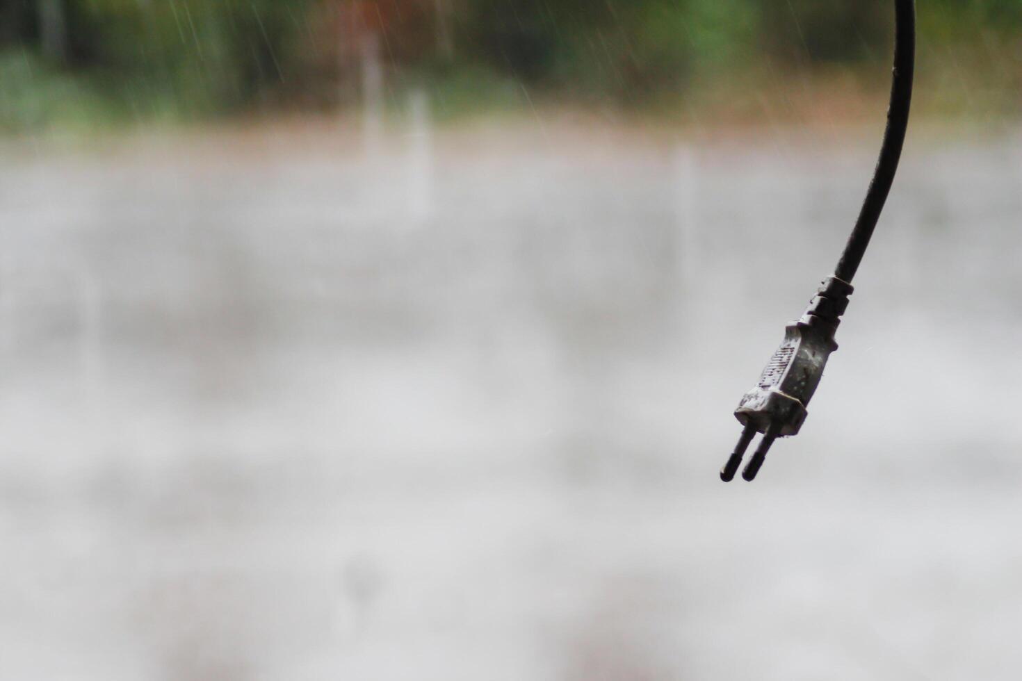 The rain was falling on the roadway due to a precipitation that was forming after the depression hit Thailand, causing heavy rains in some areas and flooding the road surface. photo