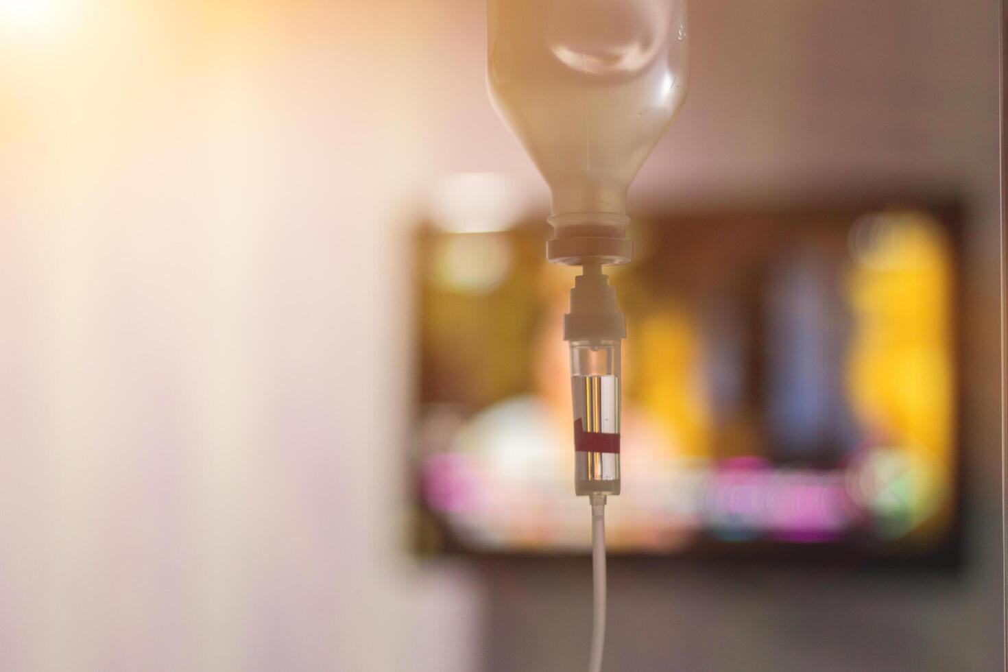 Soft Light and Blur,The patient is being given saline solution due to the debilitating corona virus infection and the coronavirus compromises the immune system and respiratory disorders. photo