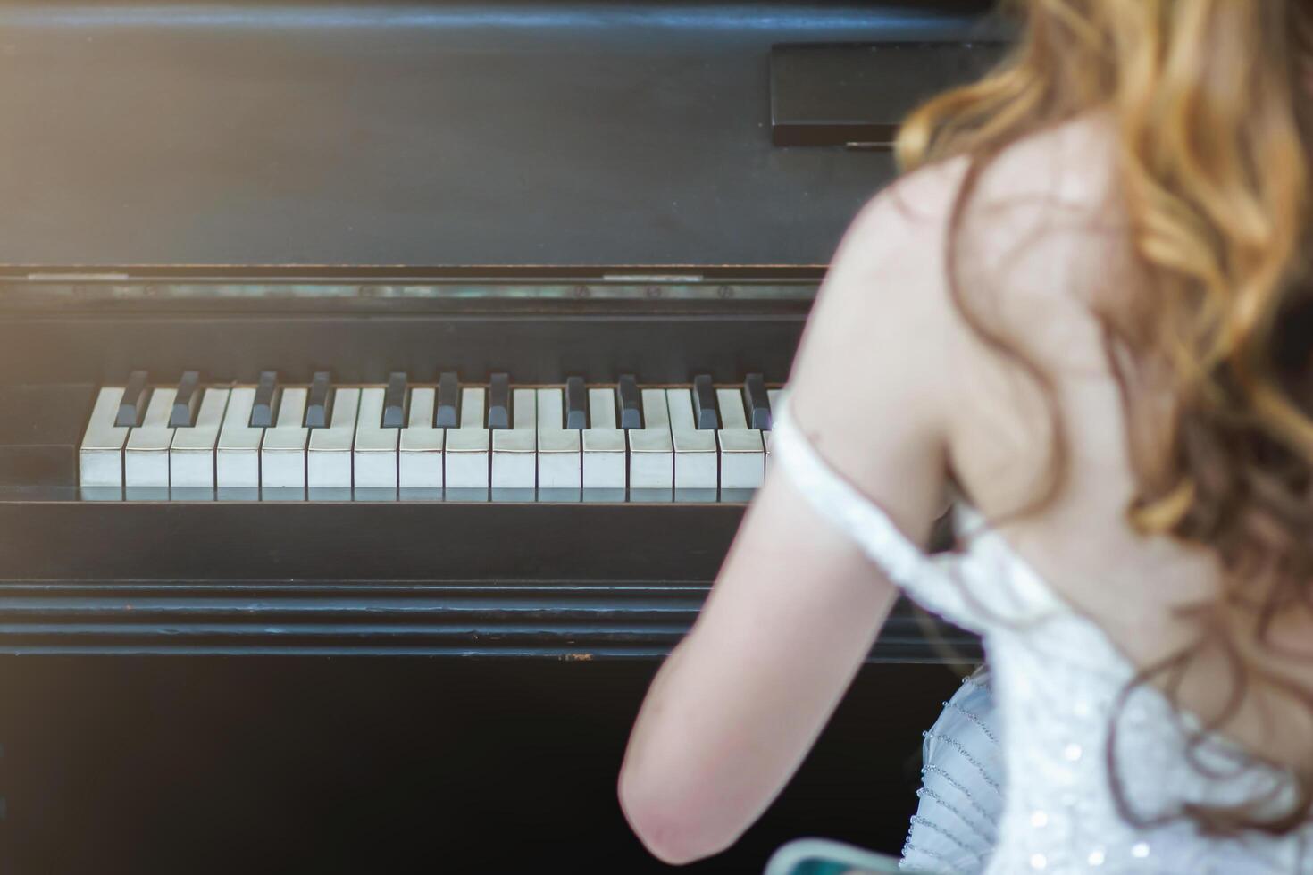 Beautiful piano background are set by the window in the morning waiting for the pianist to come to practice in the morning to reduce the mistake of having to perform the piano performance at a concert photo