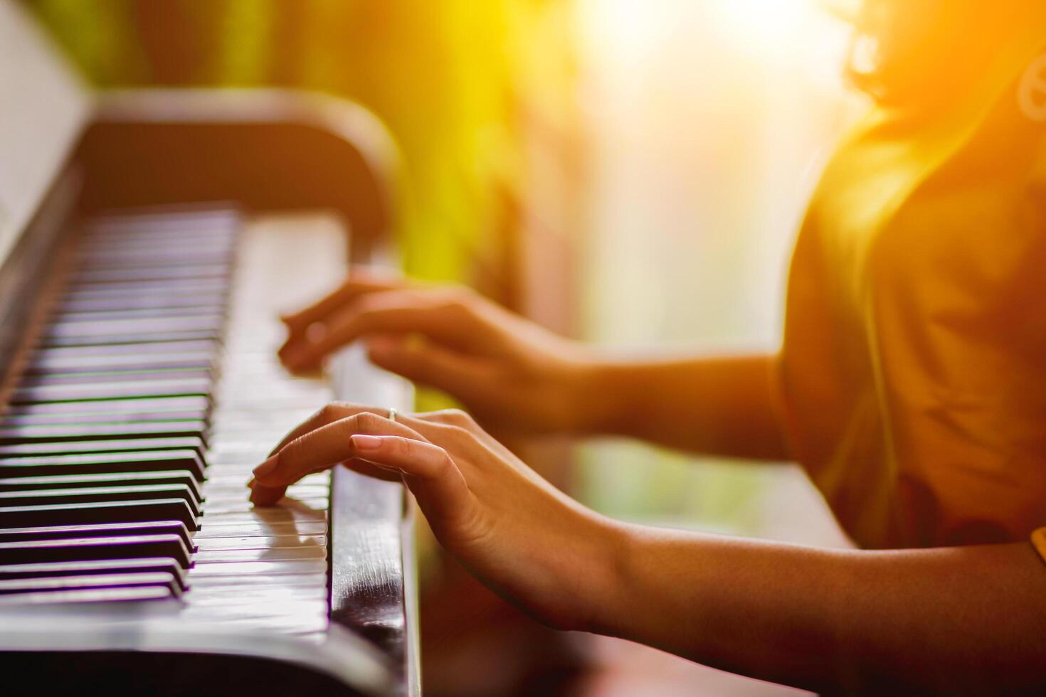 Beautiful piano background are set by the window in the morning waiting for the pianist to come to practice in the morning to reduce the mistake of having to perform the piano performance at a concert photo