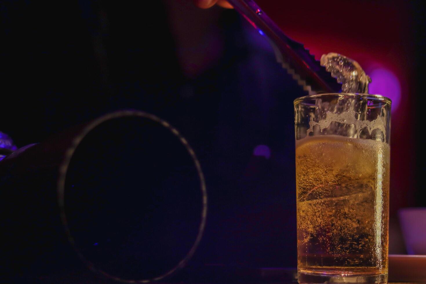 The silhouette of a beer mug placed on a table in the pub is a beer mug prepared for tourists as beer is a popular drink and helps to relax after work. photo