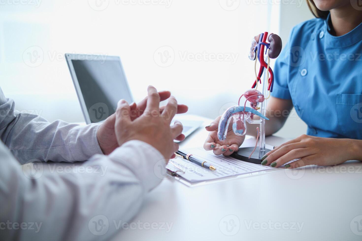 A young man was diagnosed with a tumor in his prostate and the medical team diagnosed him with prostate cancer and provided counseling to health care patients to undergo cancer treatment and surgery. photo