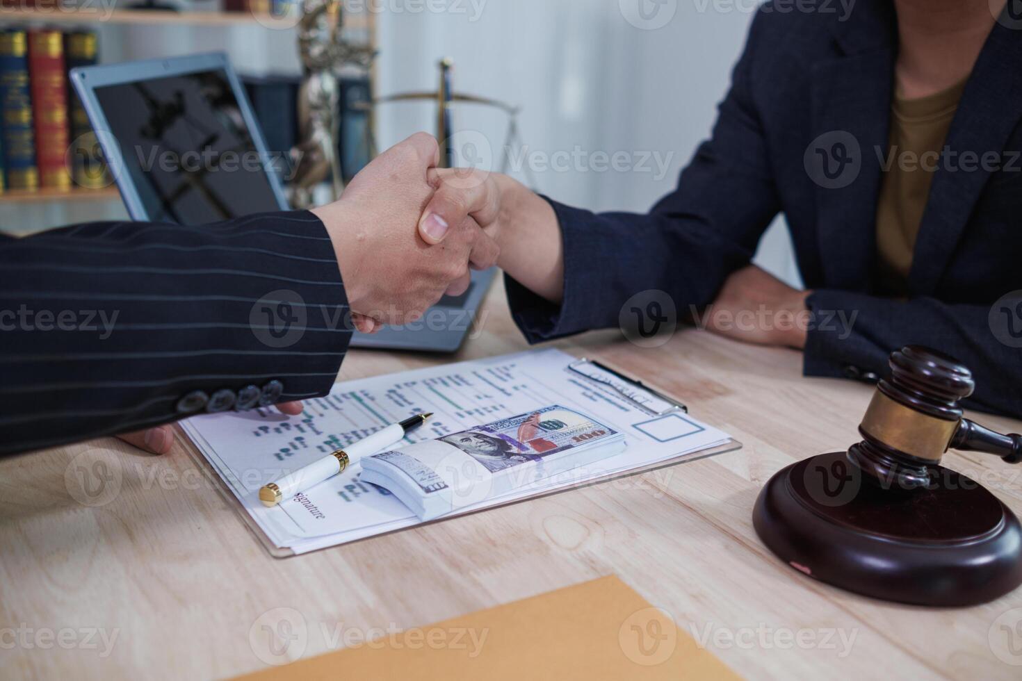 The businessman offered cash to prosecutors as a bribe to help change the verdict in the case, knowing that bribery is a serious and illegal crime. The concept of bribing government officials photo