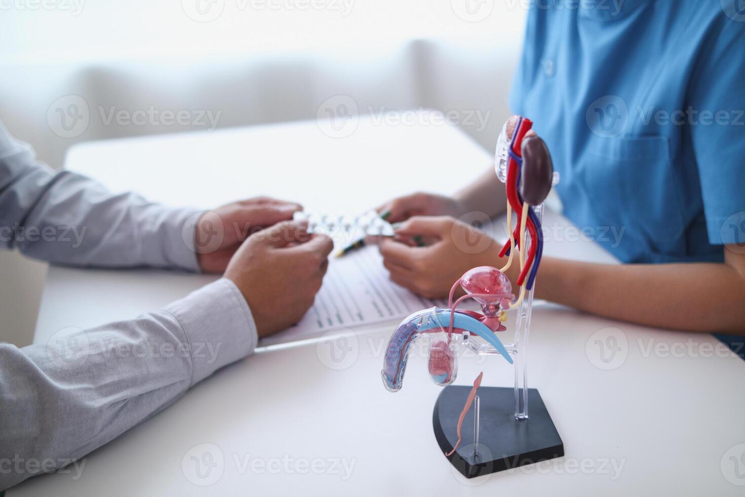 A young man was diagnosed with a tumor in his prostate and the medical team diagnosed him with prostate cancer and provided counseling to health care patients to undergo cancer treatment and surgery. photo