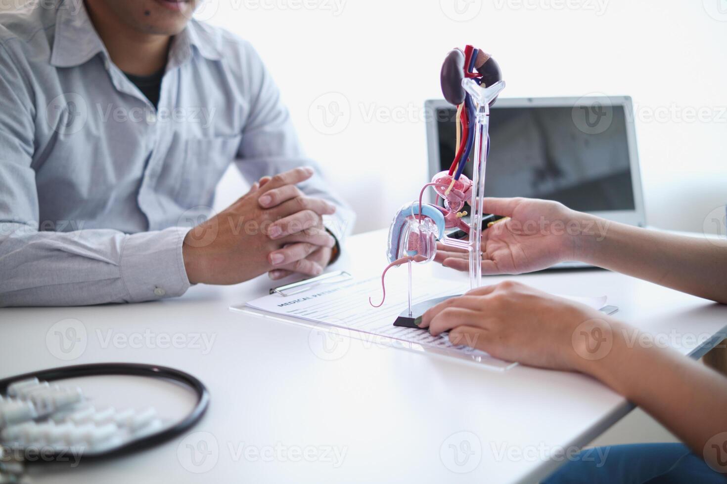 A young man was diagnosed with a tumor in his prostate and the medical team diagnosed him with prostate cancer and provided counseling to health care patients to undergo cancer treatment and surgery. photo
