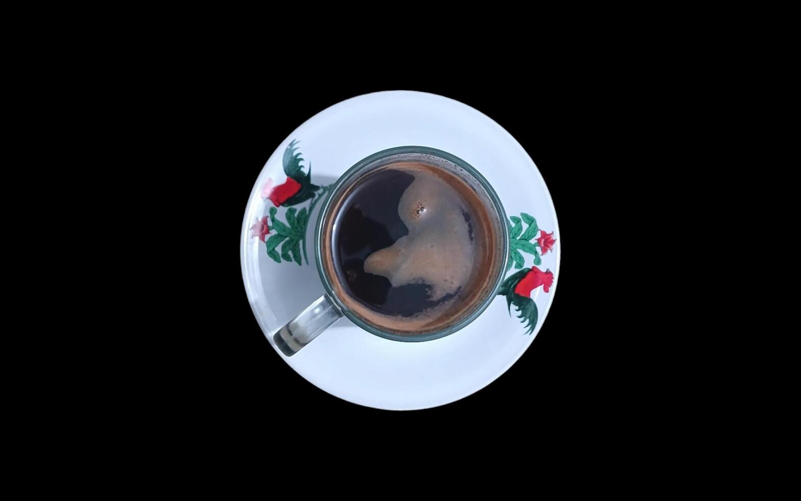 Coffee drink in ceramic cup on black background. photo