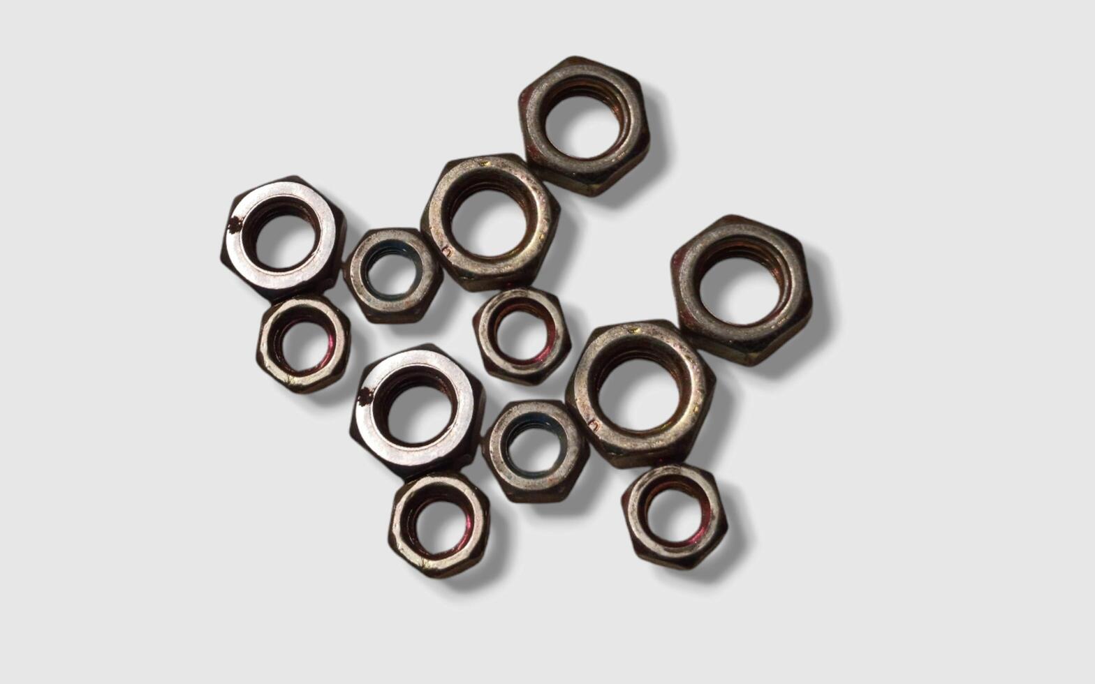 Macro image of metal nut isolated on white background. Steel nut isolated. Tools for work. photo