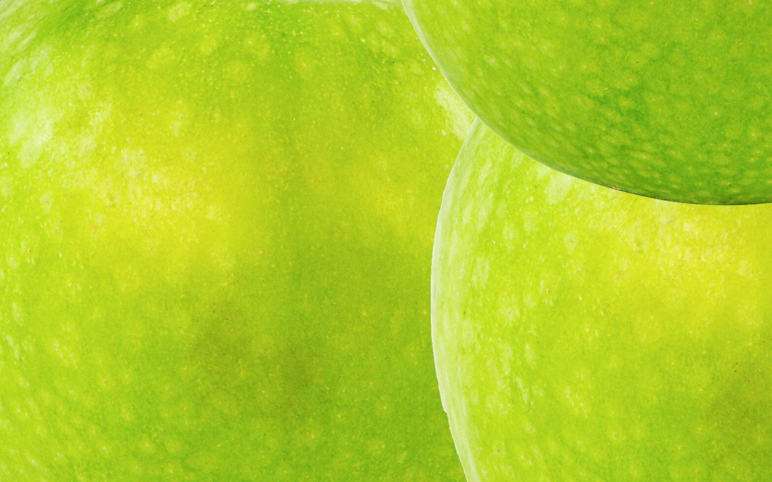 Green apple skin texture smooth background. Suitable for additional design projects. photo