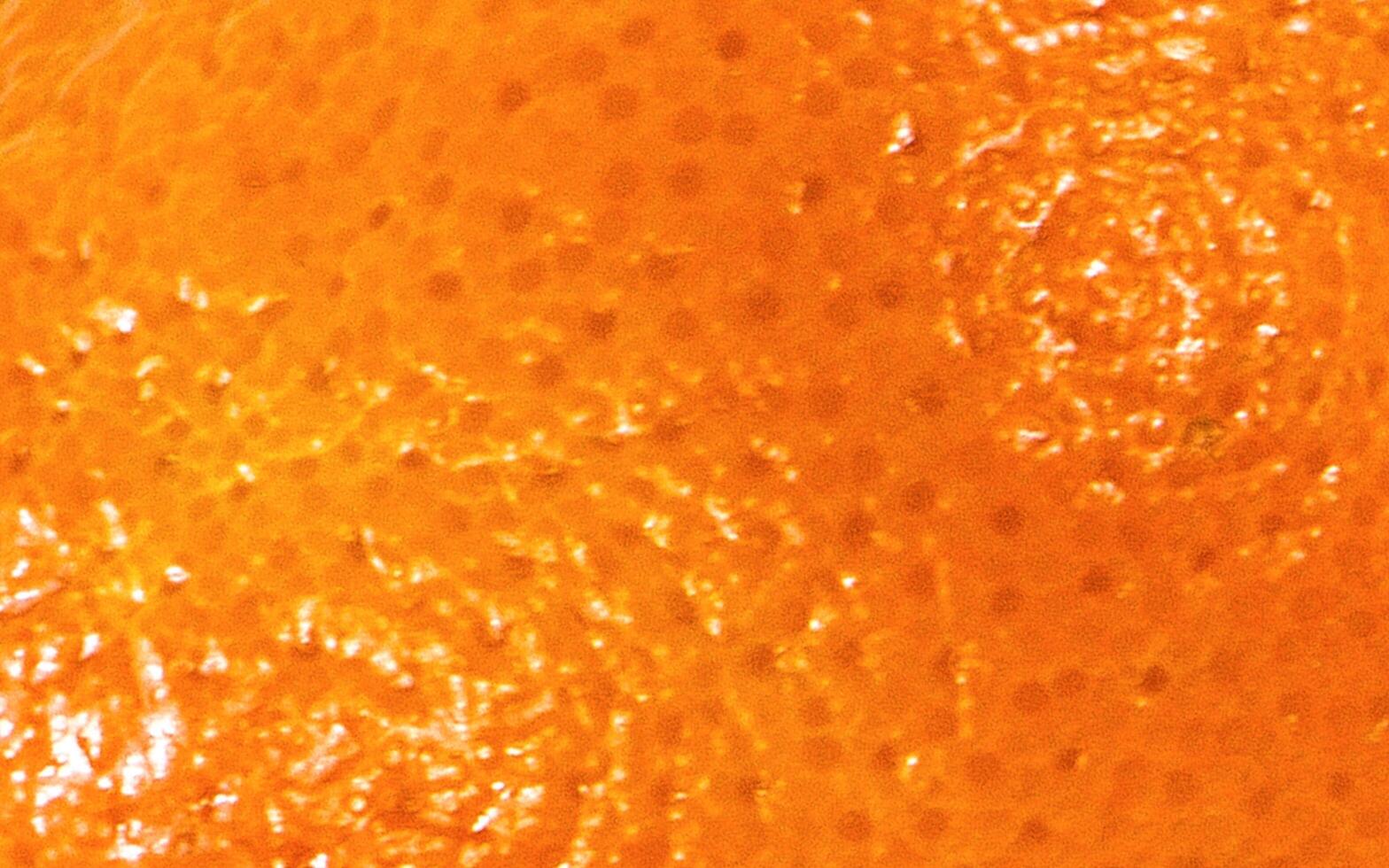 Yellow orange peel texture background. Good for fruit advertising design project photo