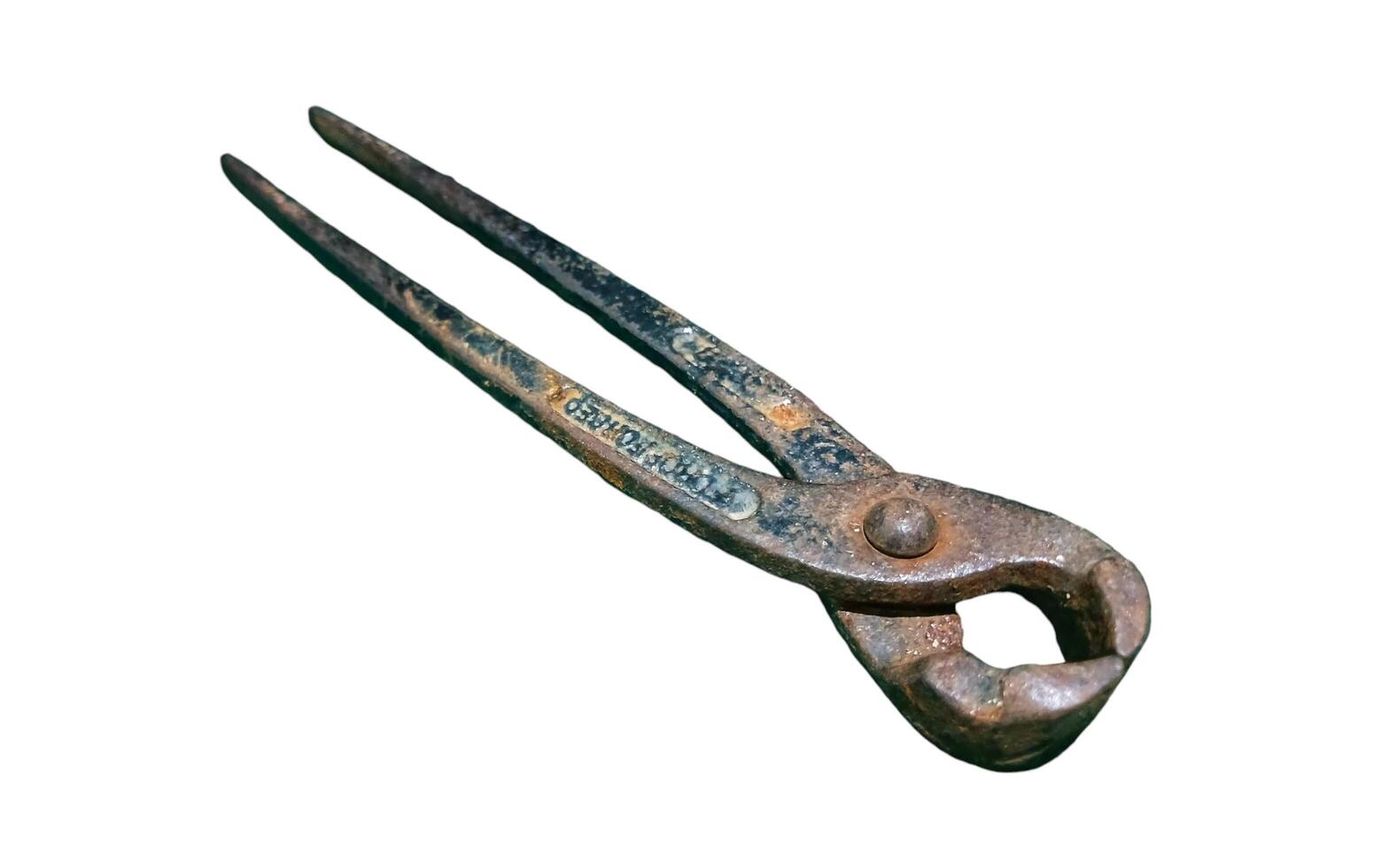 Black pliers isolated on white background. Electrical equipment, work tools. photo