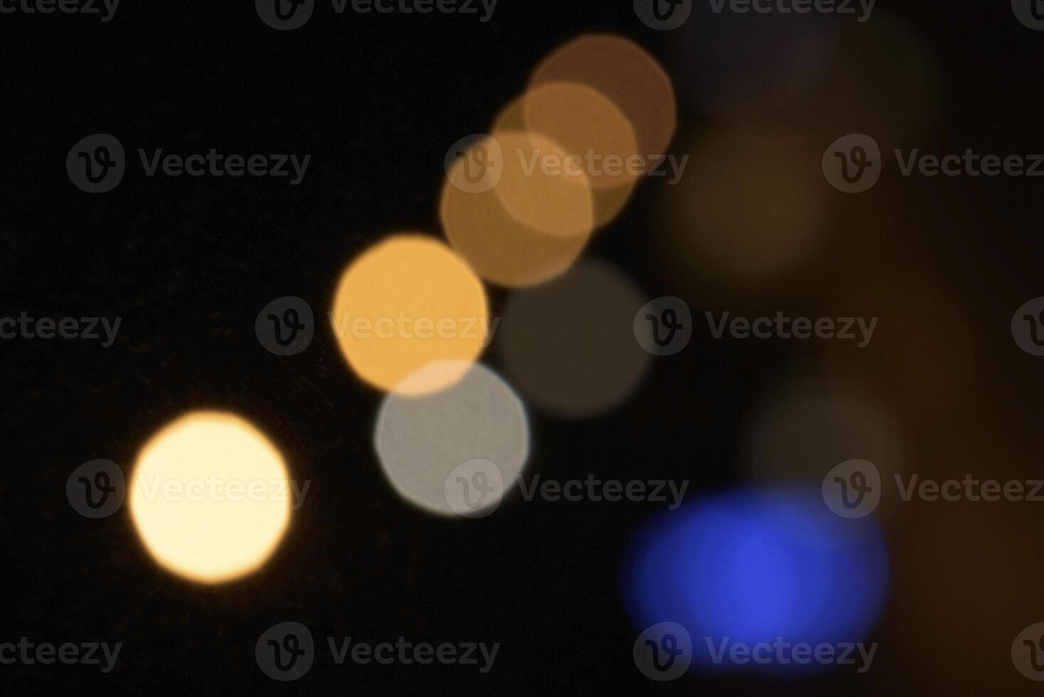 Lights on the street in the night. Blurred. Copy space. Background photo