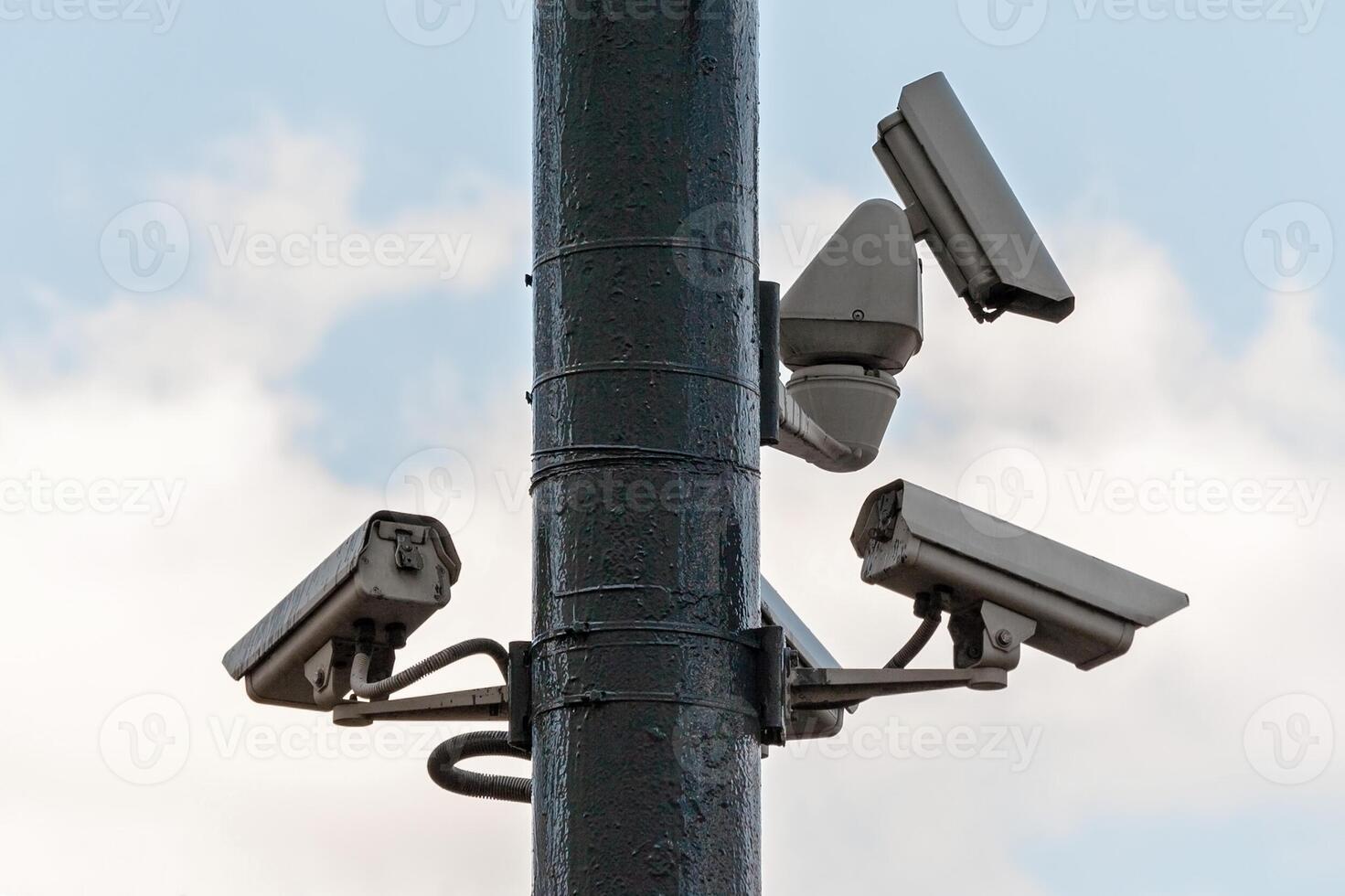 Surveillance Cameras on the pole photo