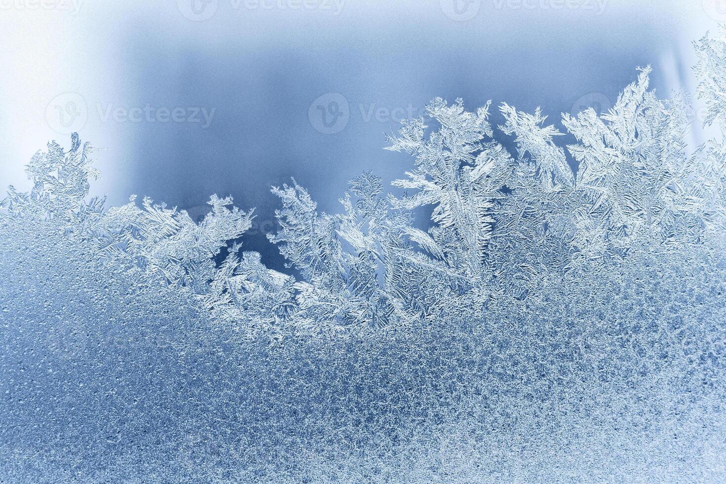 Frosty pattern on the window glass. Abstract, background photo