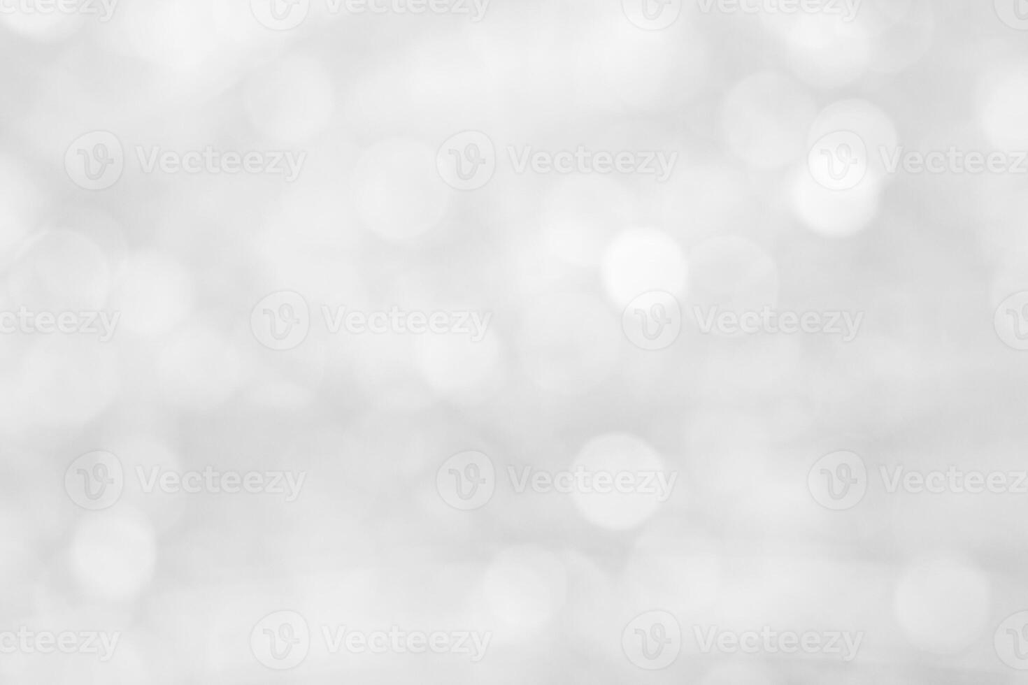White bokeh glitter in blur as background photo