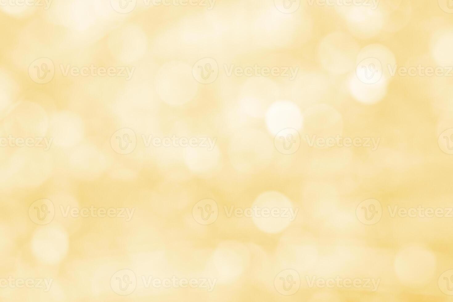 Light orange bokeh glitter in blur as background photo
