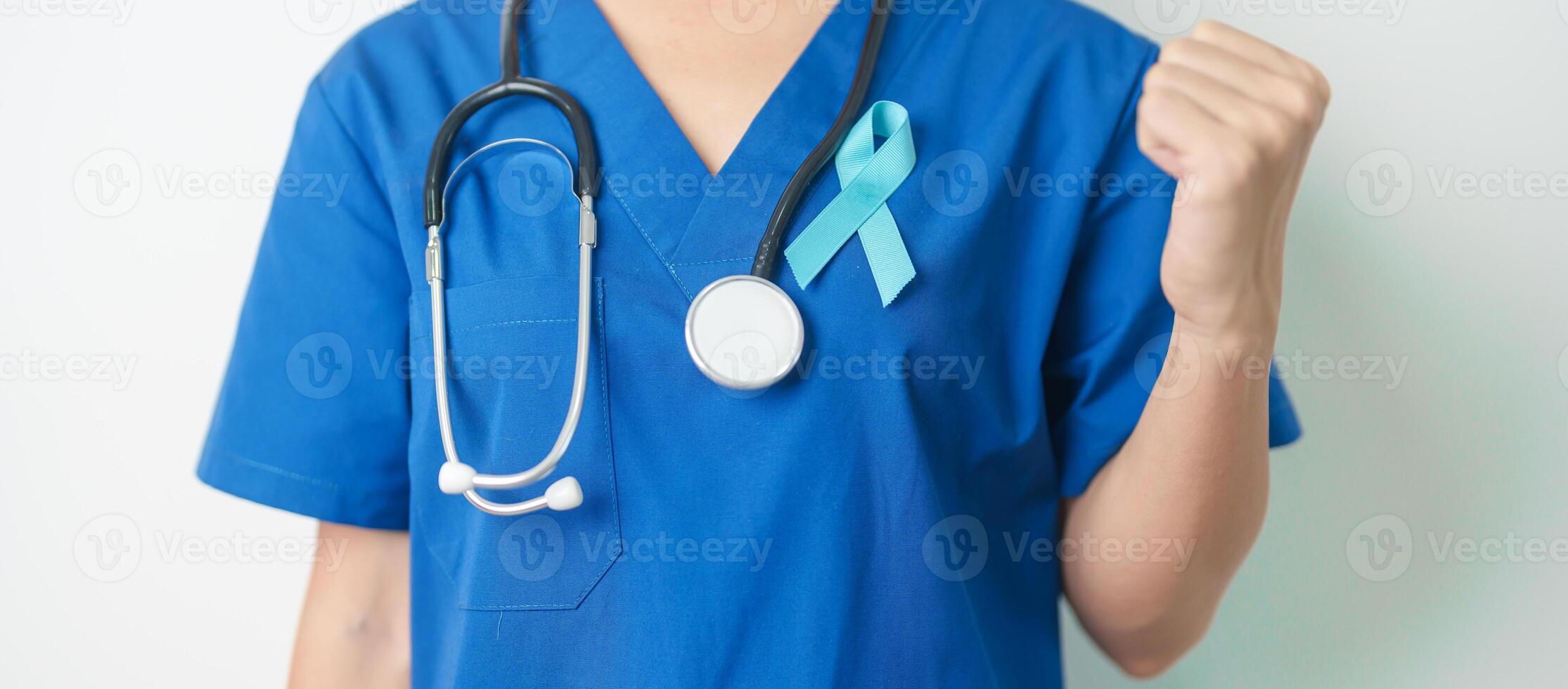 Blue November Prostate Cancer Awareness month, Doctor with Blue Ribbon in hospital for support people life and illness. Healthcare, International men, Father, Diabetes and World cancer day photo