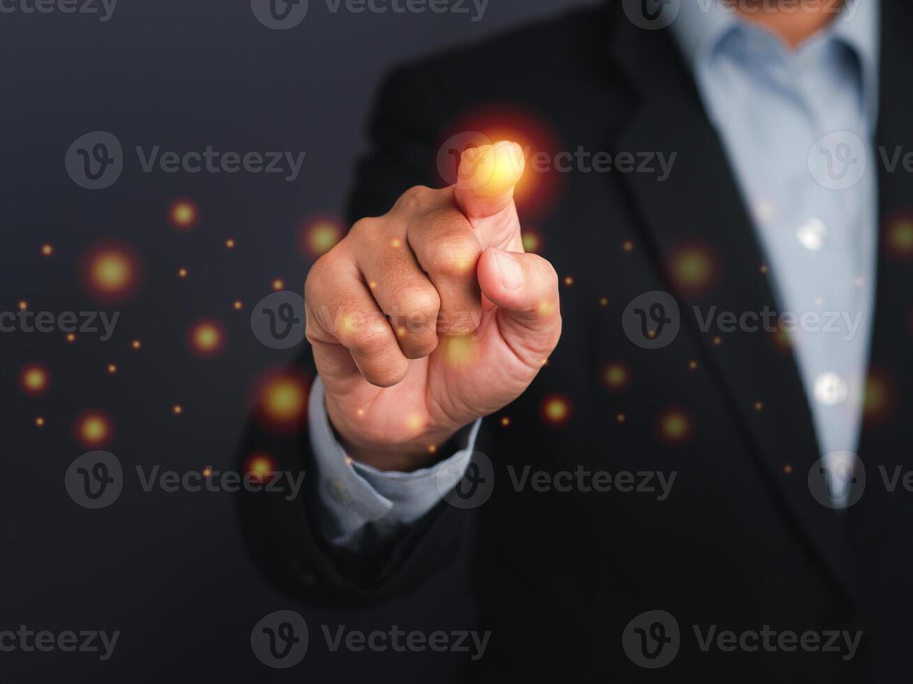 Businessman pressing a button on virtual screen. Man pointing on a futuristic interface. Space for text. Futuristic business and Innovation technology internet business concept photo