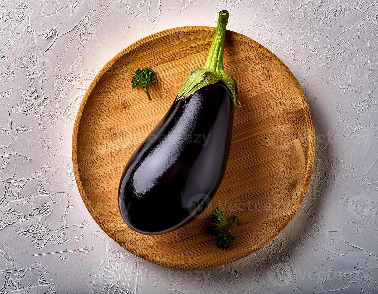 Top of view of fresh eggplant with stem on the white background photo