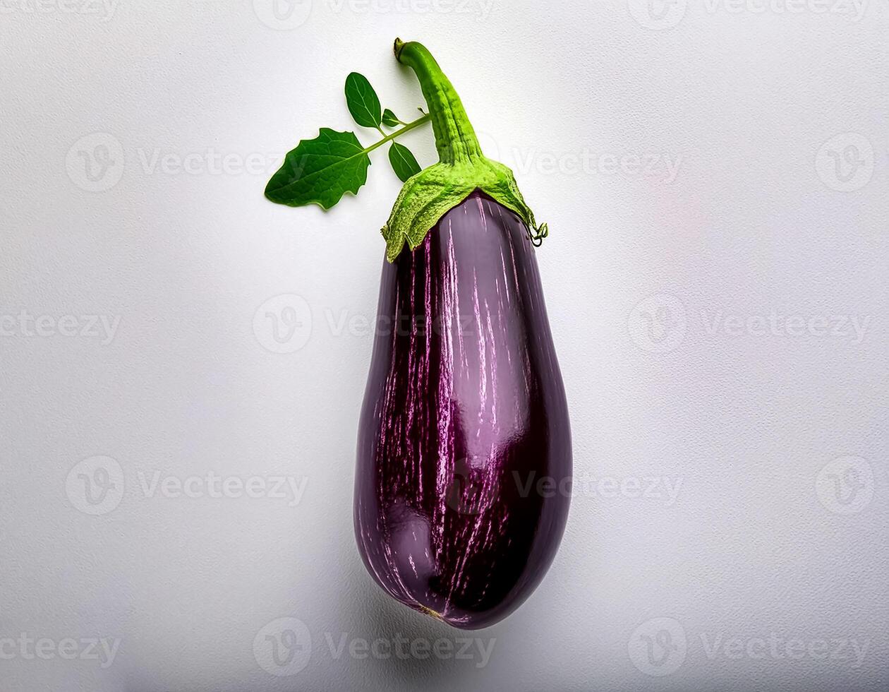 Top of view of fresh eggplant with stem on the white background photo
