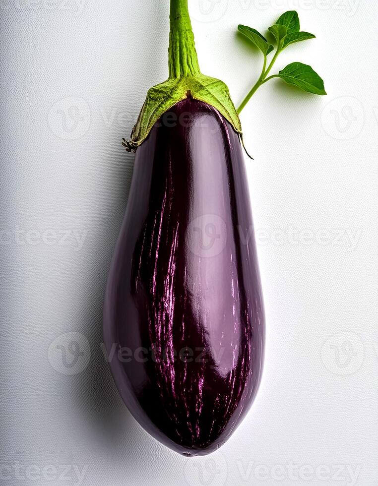 Top of view of fresh eggplant with stem on the white background photo