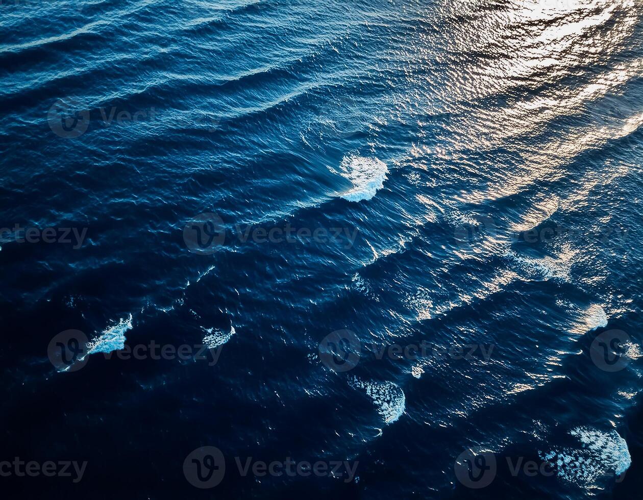 empty abstract sand beach with palm leaf shadow and transparent water wave from above, blank background banner for travel, vacation and wellbeing with copy space. top of views, aerial views. photo