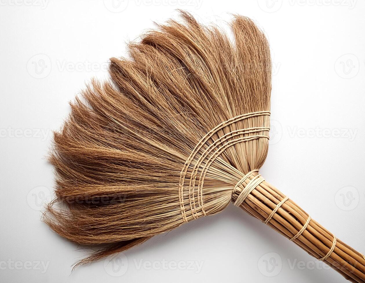 Top of view one broom stick on the white background photo
