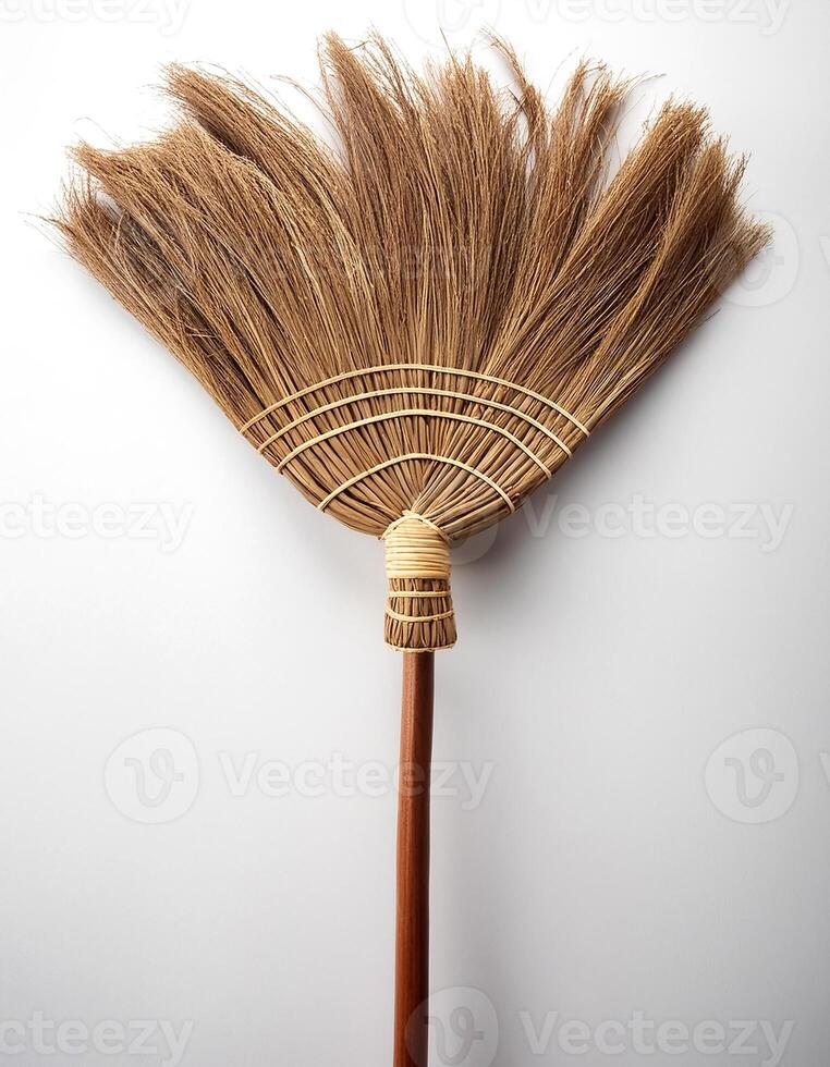Top of view one broom stick on the white background photo
