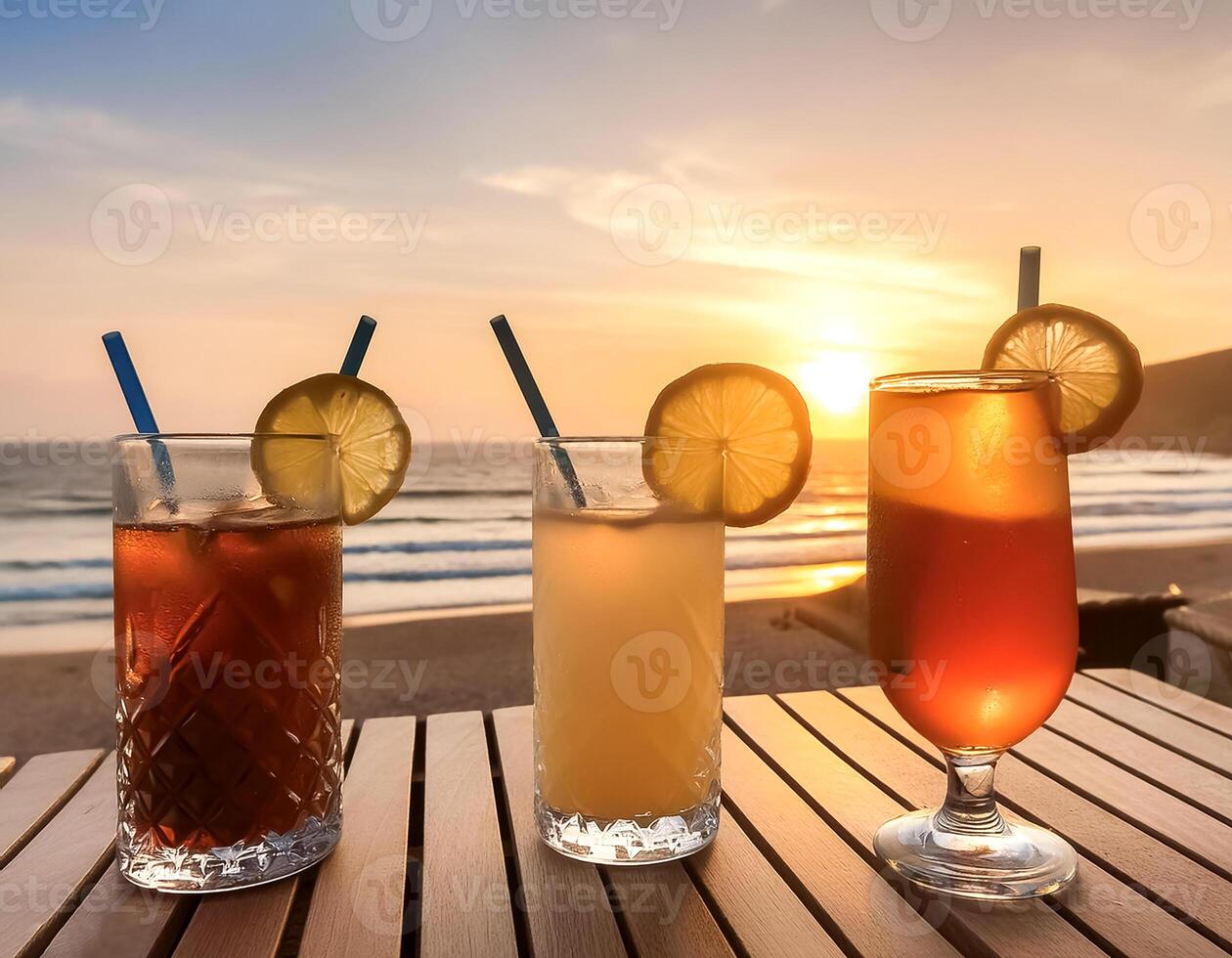 drinks with blur beach and sunset in background. concept of leisure, holiday, relaxation photo