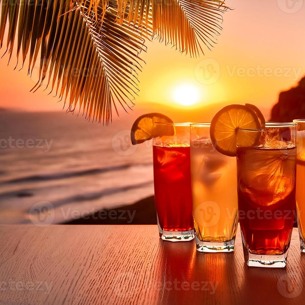 drinks with blur beach and sunset in background. concept of leisure, holiday, relaxation photo