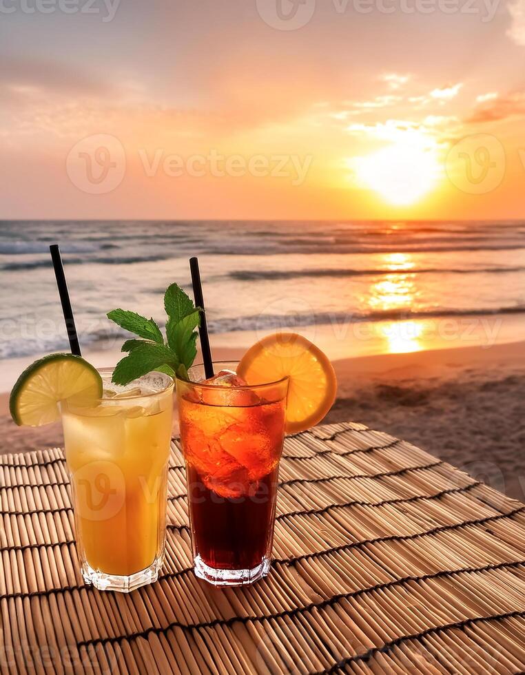 drinks with blur beach and sunset in background. concept of leisure, holiday, relaxation photo
