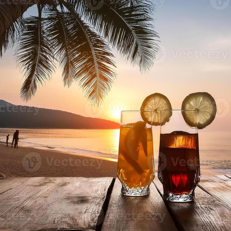 drinks with blur beach and sunset in background. concept of leisure, holiday, relaxation photo