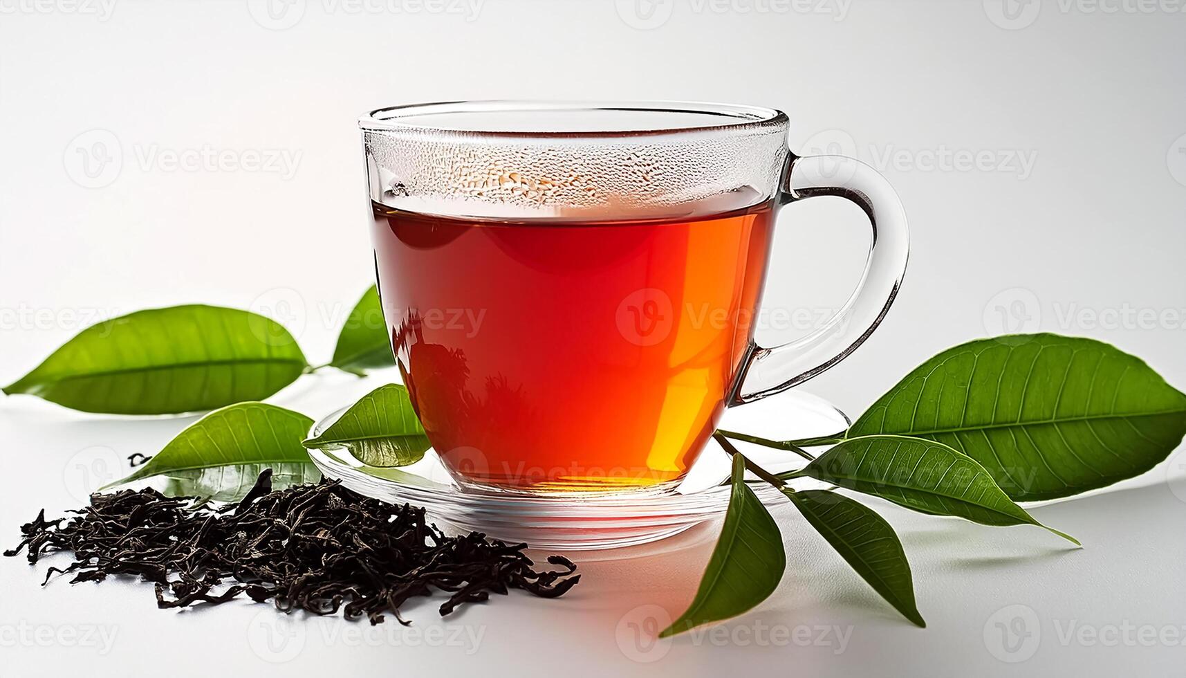 Glass cup of hot aromatic tea with leaves on clear white background photo