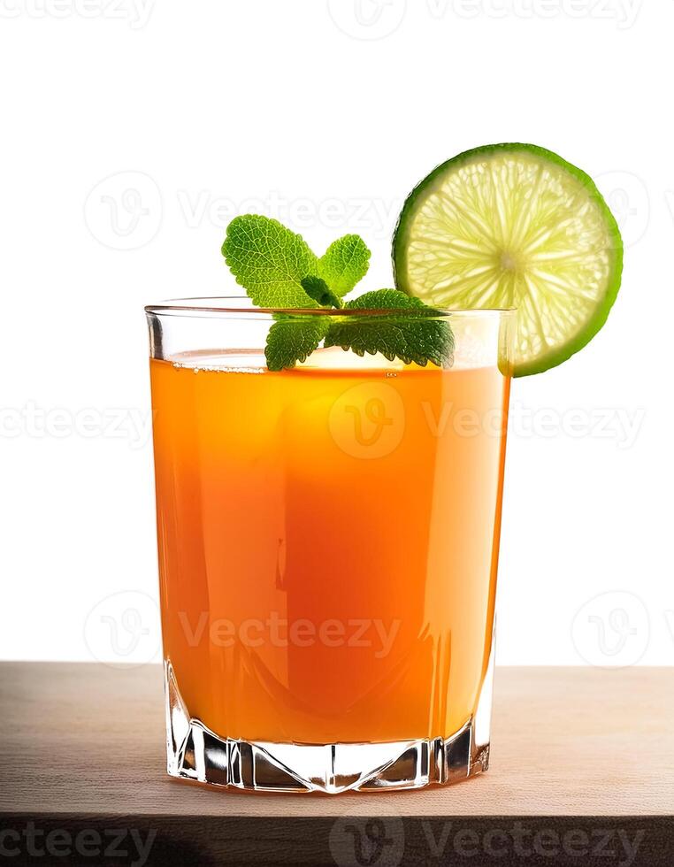 tropical drink concept. Orange cocktail with lime garnish. photo
