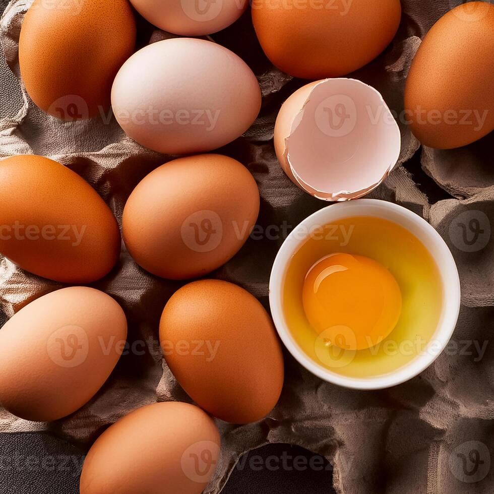 photo pallet with eggs and raw broken egg with yolk. Pattern texture background