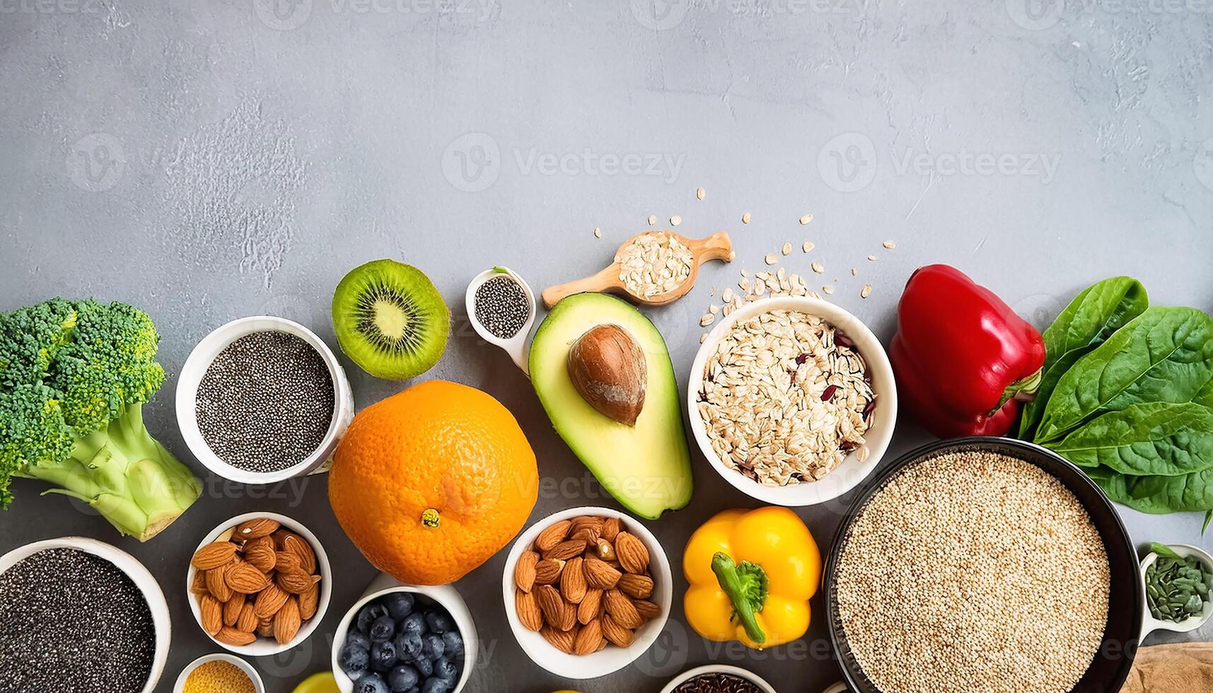 Healthy food, clean eating, choice of fruit, vegetables, grains, superfoods, cereals, leafy vegetables concrete photo