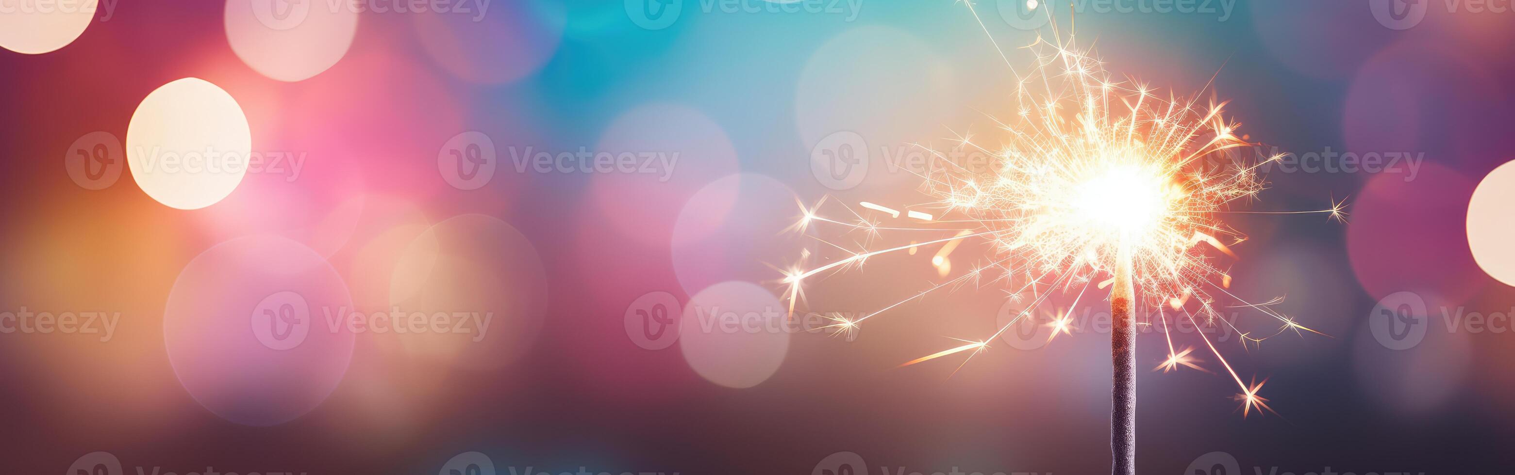 Close-Up Sparkler With Blurry Lights photo
