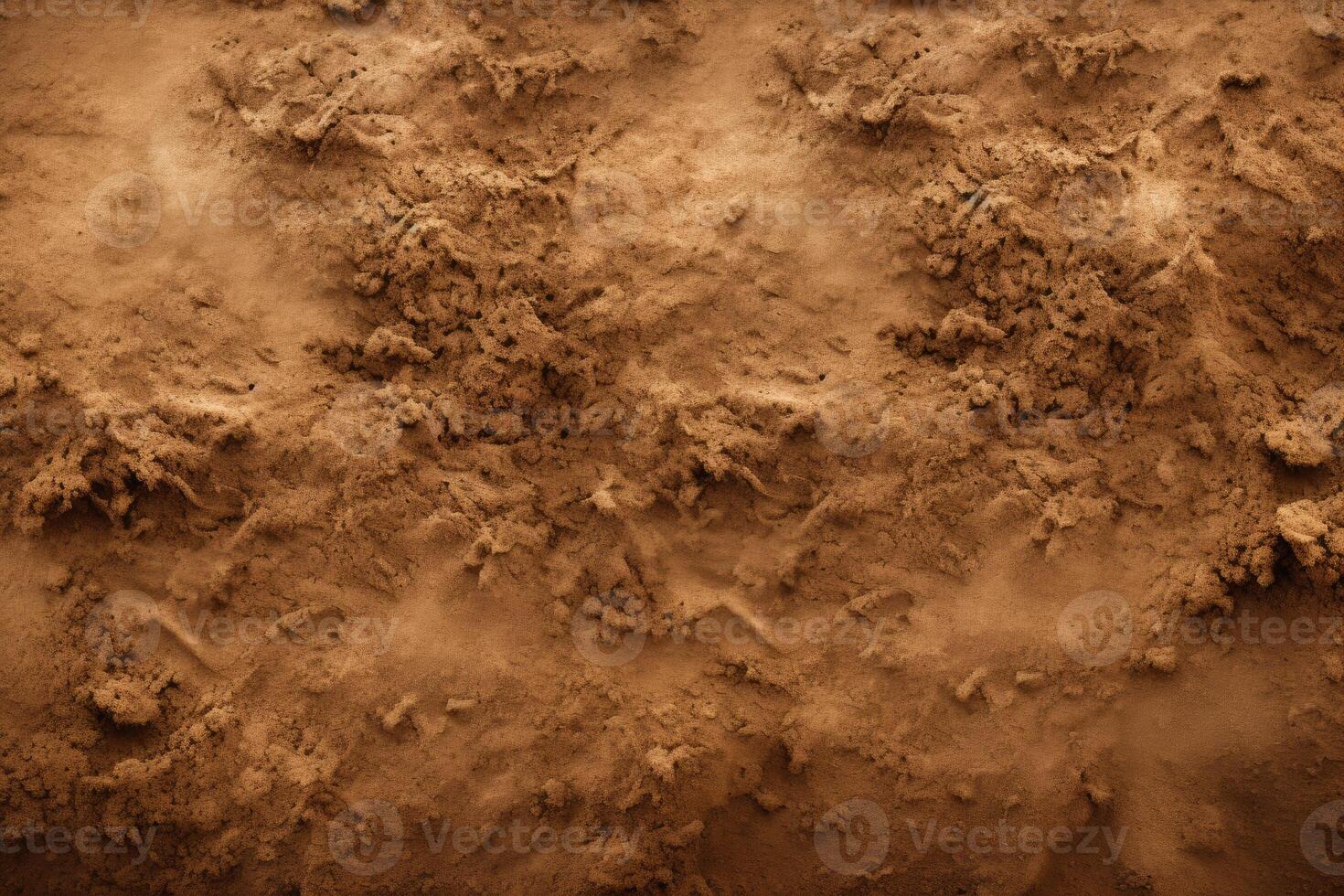 Close-Up of Dirt Surface on Brown Background photo