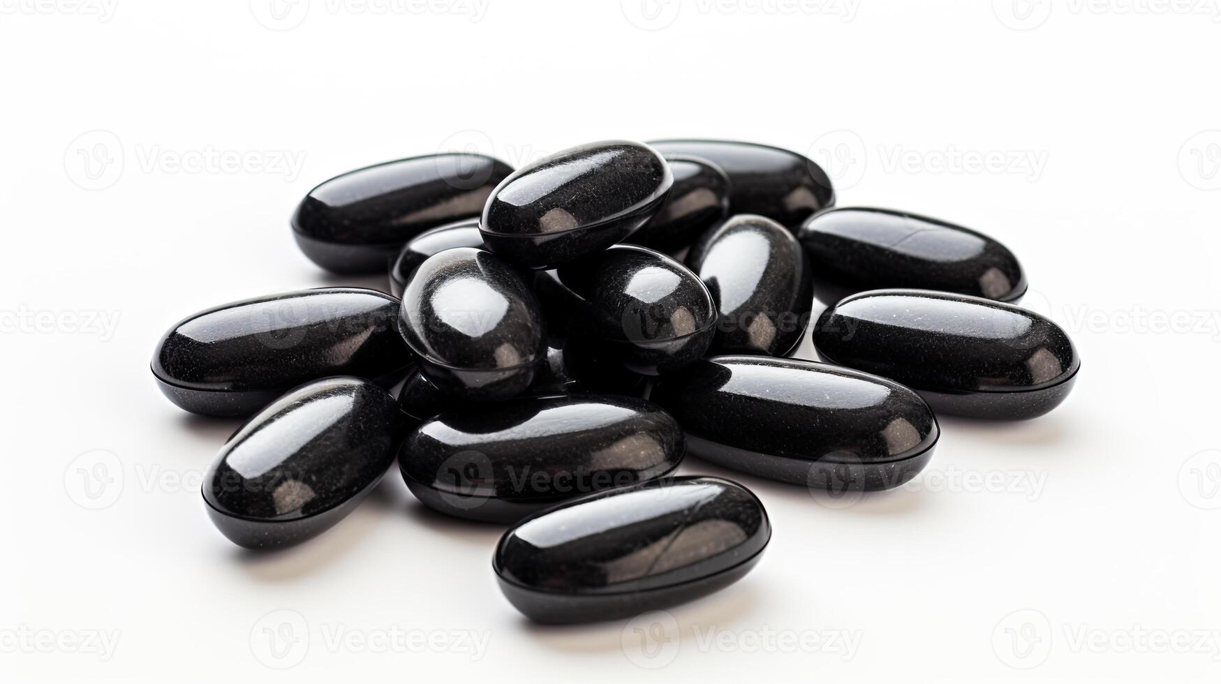 Stack of Black Pills on White Table photo