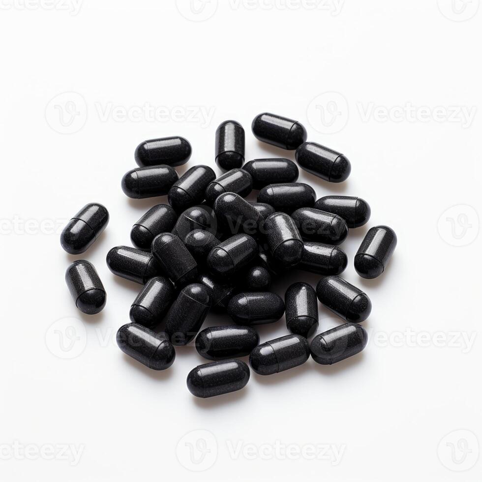 Pile of Black Pills on White Table photo