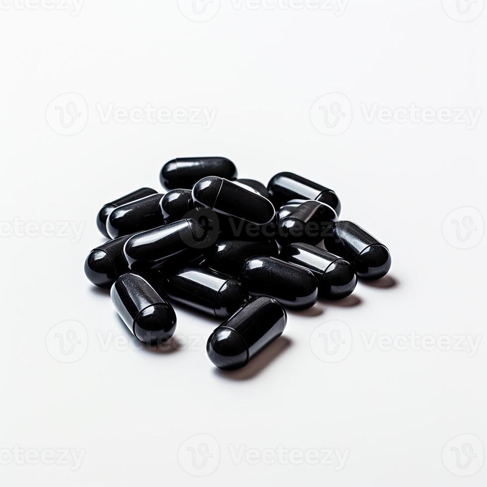 Pile of Black Pills on White Table photo