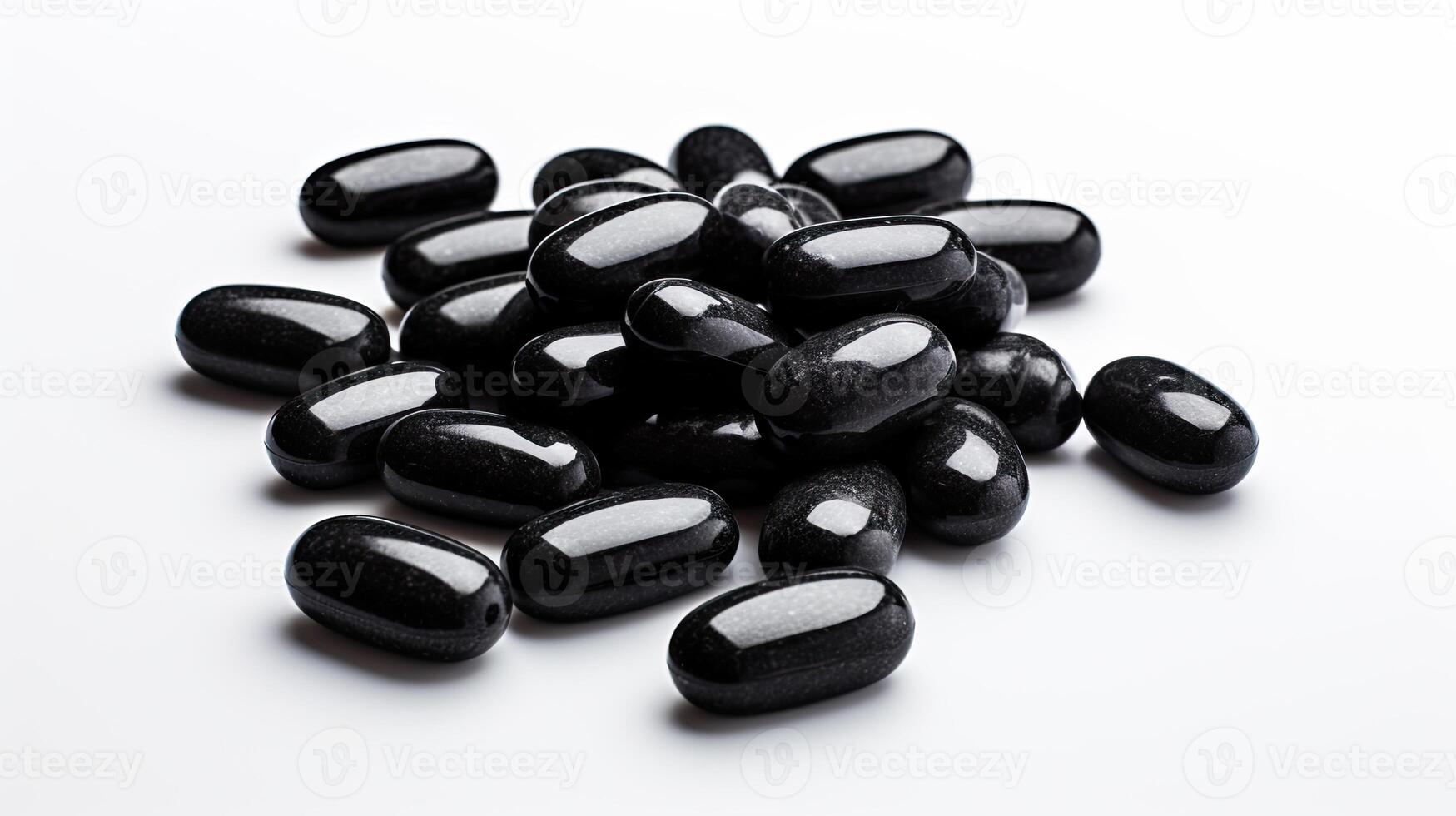 Stack of Black Pills on White Table photo